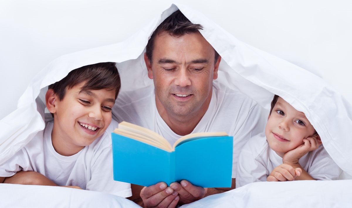 Dad Reading Books With Kids